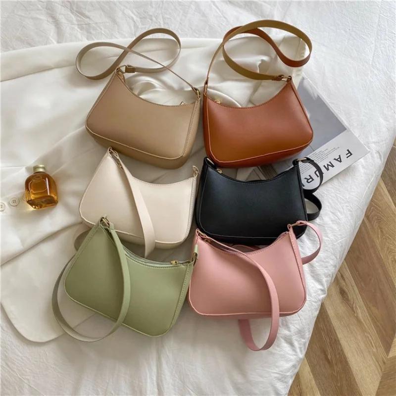 Retro hobo purse for women in synthetic leather with zipper closure. Available in white/green/black. Ideal for casual use or vacations. Features adjustable strap.