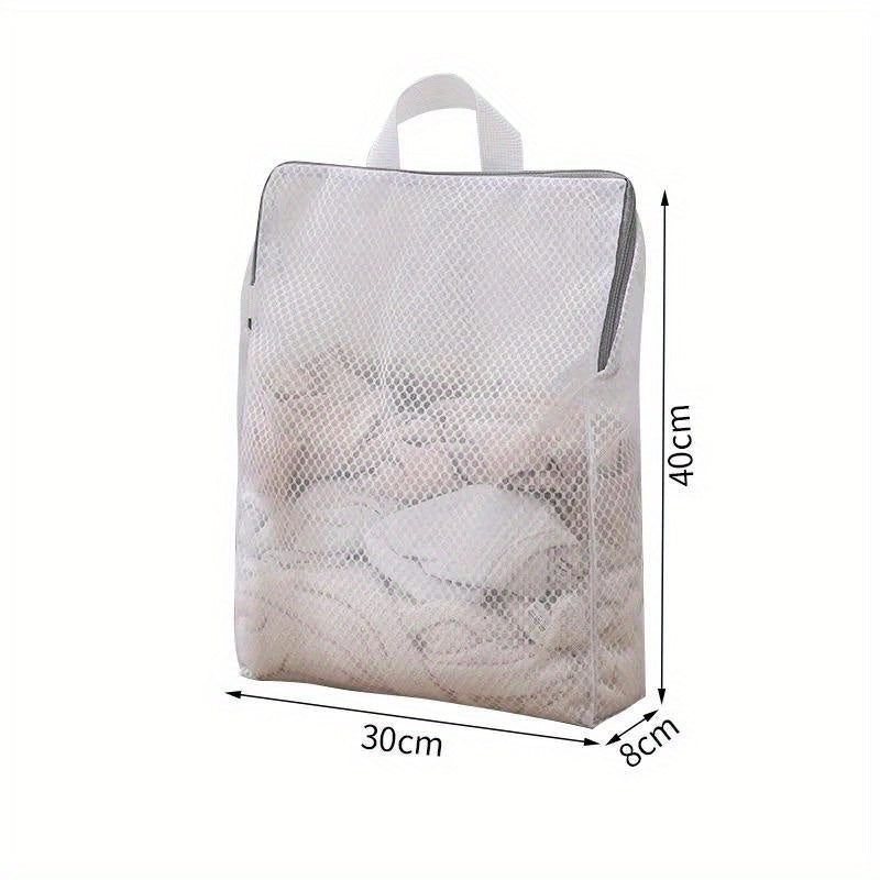 Set of durable polyester mesh laundry bags with zipper for washing machine, perfect for washing delicates such as bras, socks, and lingerie. These woven apparel wash bags are reusable and great for clothing care and laundry storage.