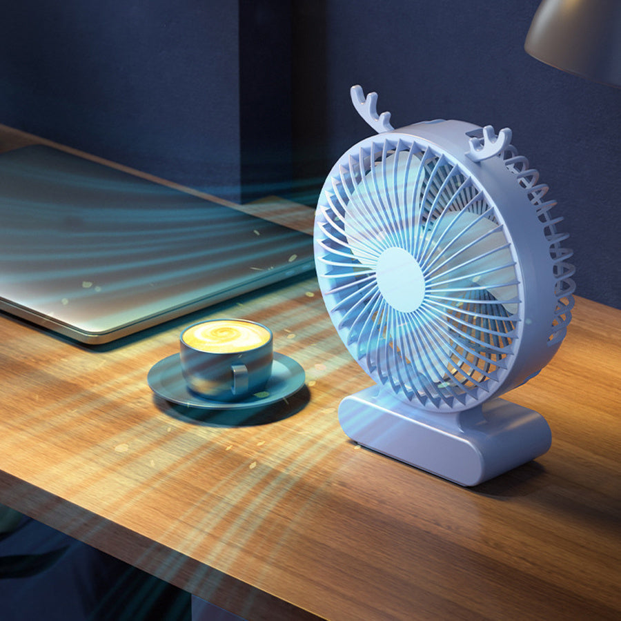 Stay Cool with our Deer-Inspired USB Desktop Fan - Compact, Quiet, and Portable in Blue & Green. Perfect for Office, Travel, and Camping, Powered by a Rechargeable Lithium Battery. Enjoy Indoor Airflow Anywhere with Durable Fan Blades.