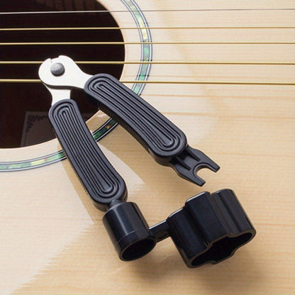 3-in-1 Guitar Maintenance Tool: String winder, cutter, and pin puller - durable ABS and stainless steel, easy to use.