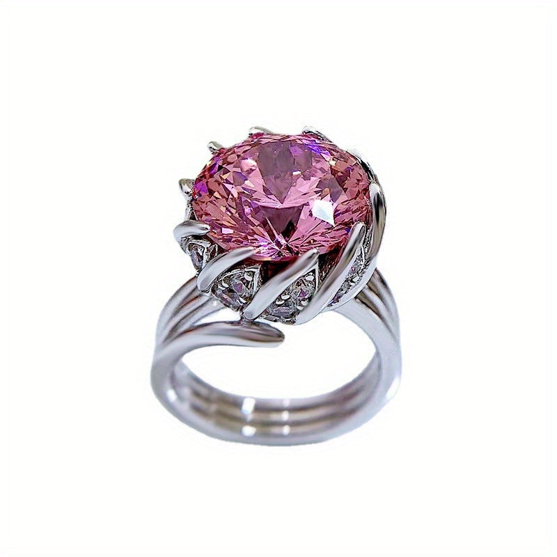 This elegant Lotus Flower ring is crafted from 925 Sterling Silver and features a stunning 7.5 Carat Pink Synthetic Gemstone. It comes with a gift box included, making it perfect for vacation or gifting. The Flowers Theme design and luxurious style make