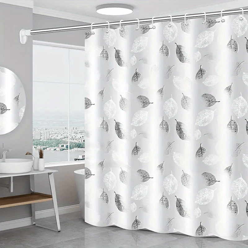 Water-resistant PEVA bath divider with metallic grommets, leaf pattern, easy to wipe clean, includes hooks for bathroom decor - perfect for gifting or home accessory.