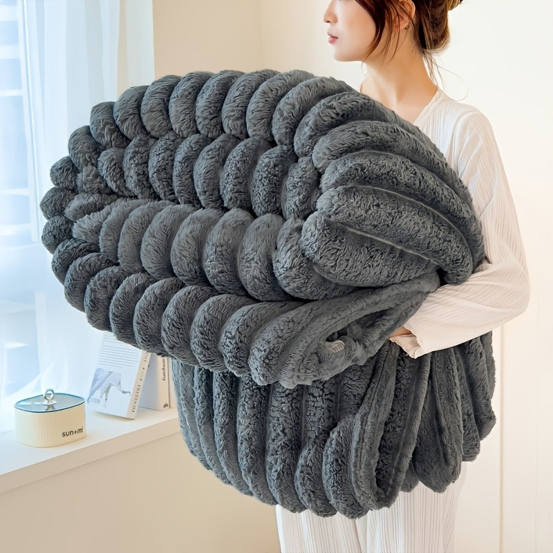 Get cozy with this multifunctional blanket made of ultra-soft milk fleece. Featuring a modern striped texture, this blanket is perfect for all-season comfort on your bed, sofa, or even while camping. Machine washable for easy care, this blanket is an