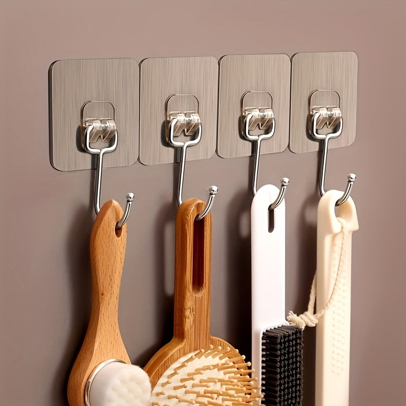 Ultra-Strong Adhesive Wall Hooks available in packs of 5, 10, 20, 30, and 50. Transparent, reusable, punch-free design suitable for bathroom and kitchen use. Waterproof and oilproof