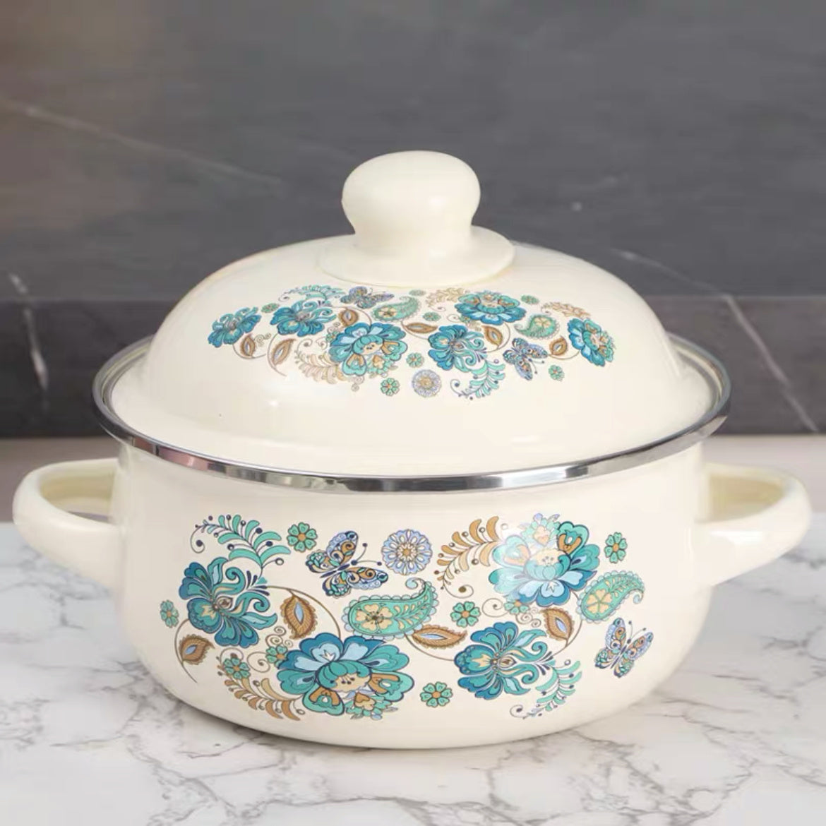 This 3-piece Enamel Cookware Set features a beautiful Floral Design, including pots perfect for soup, stew, and boiling. These versatile pots are ideal for use in the kitchen, and can be used on gas, electric stoves, and open fires. Please note that they