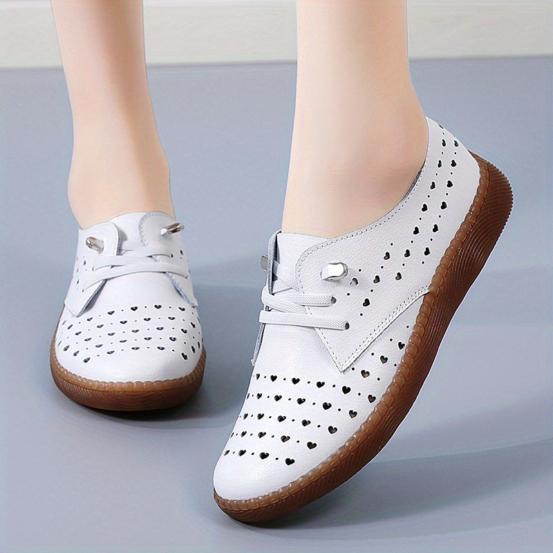 Breathable low-top sneakers for women featuring lightweight mesh design for comfortable walking.