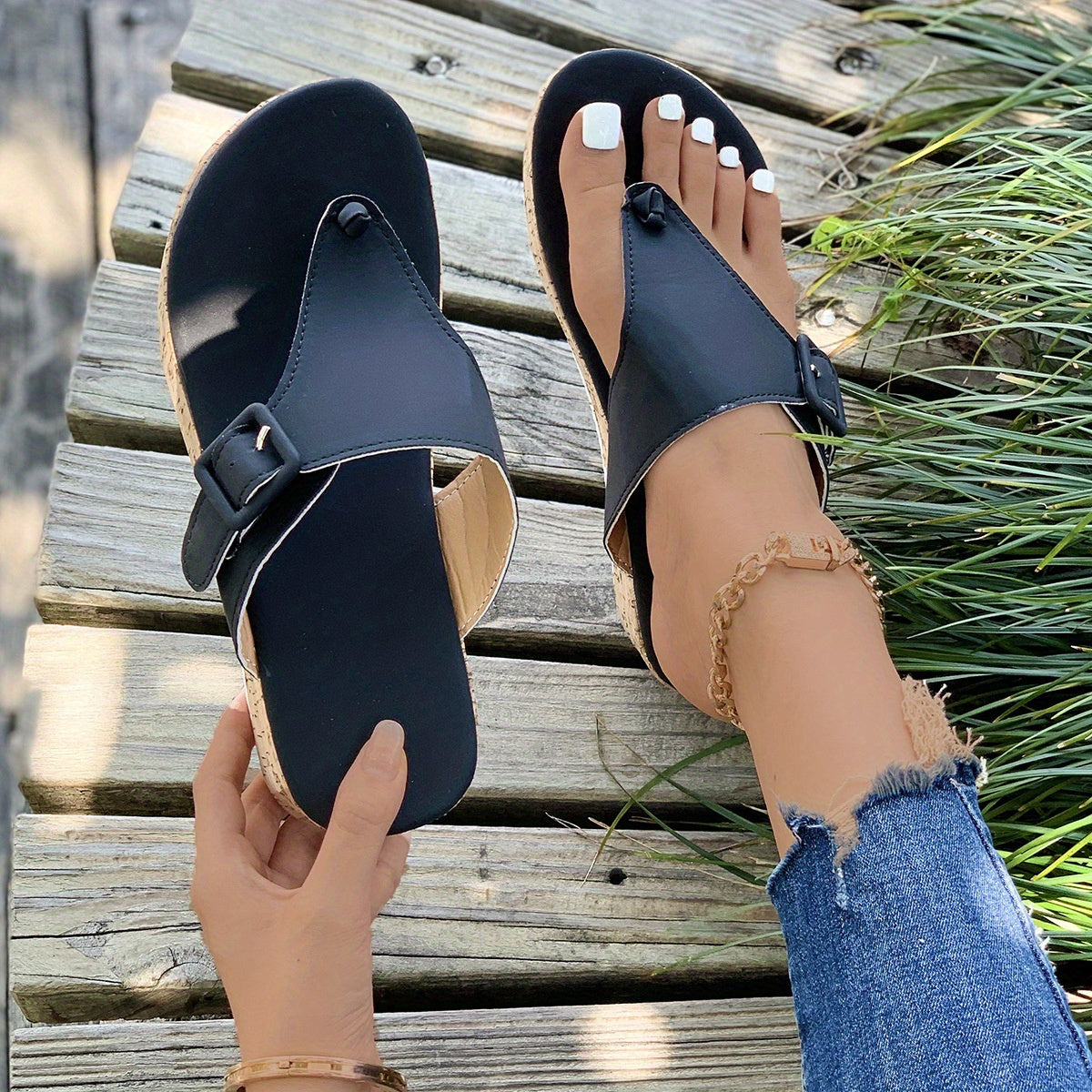 Women's platform flip flops with buckle strap, thick sole and PU sole.