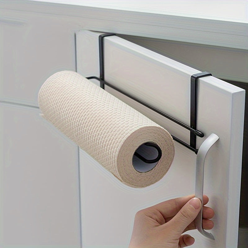 This Carbon Steel Multi-Functional Storage Rack mounts to the wall in the kitchen or bathroom without the need for drilling. It is ideal for organizing tissue and plastic wrap, offering convenient storage and easy access.