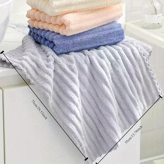 Soft coral fleece hand towel with striped design, 270 GSM, highly absorbent and lint-free for adults.