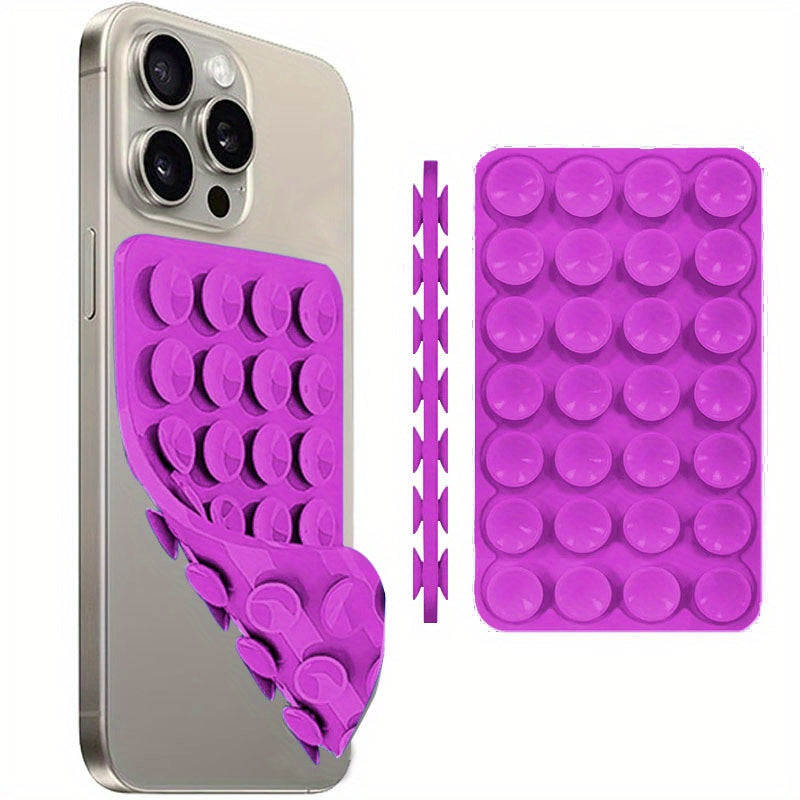 Multi-functional silicone phone grip with strong double-sided suction cup for iPhone and Android, perfect for selfies and videos.