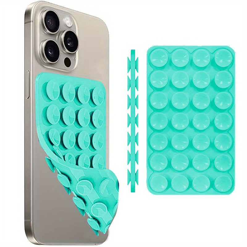 Multi-functional silicone phone grip with strong double-sided suction cup for iPhone and Android, perfect for selfies and videos.