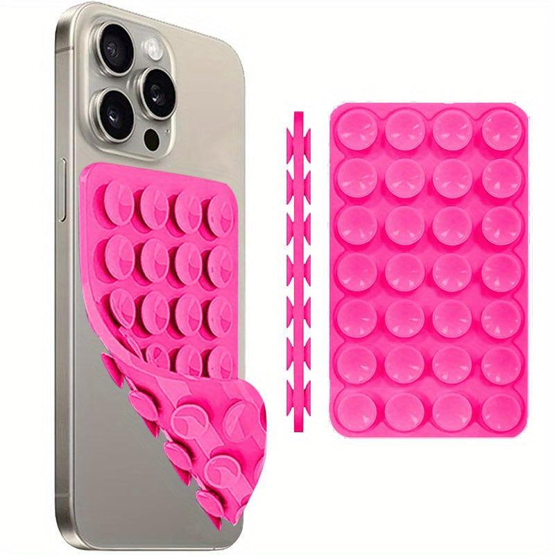 Multi-functional silicone phone grip with strong double-sided suction cup for iPhone and Android, perfect for selfies and videos.