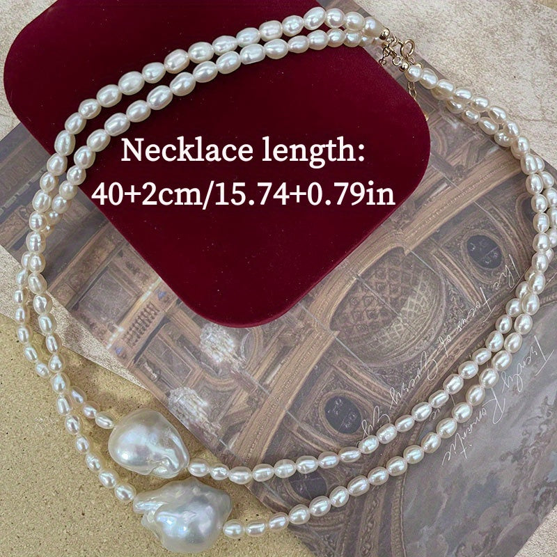 This handcrafted luxury necklace features elegant Baroque style natural freshwater pearls on an irregular clavicle chain. Each pearl has a unique storytelling quality with natural imperfections, making it perfect for daily wear or on vacation. Elevate