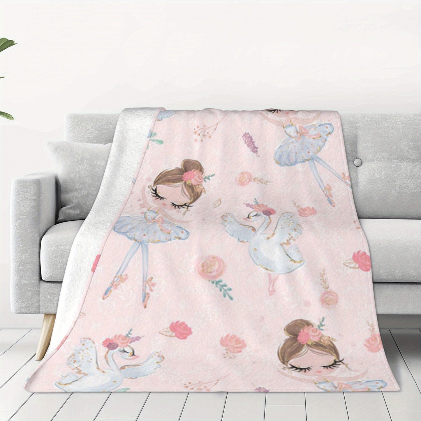 Soft and comfortable, this adorable pink blanket features a ballet dancer pattern on a velvet printed background. It is versatile enough to use as a nap blanket or small throw, making it the perfect birthday gift for anyone who appreciates creative