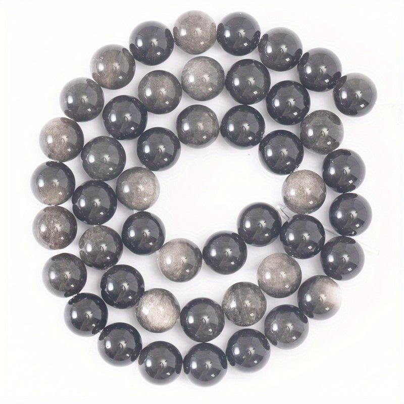 XULIN offers a set of 6/8/10mm Natural Stone 7A Silvery Obsidian Beads, perfect for DIY jewelry making. These lustrous round faux gemstones can be used to create beautiful necklaces, bracelets, and earrings. Ideal for crafting fashionable and romantic