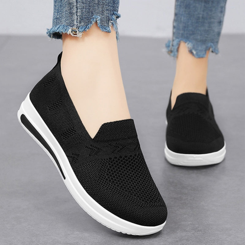 Women's lightweight, breathable flat shoes with air cushion support and slip-on design in solid colors. Stylish and comfortable for spring and autumn.