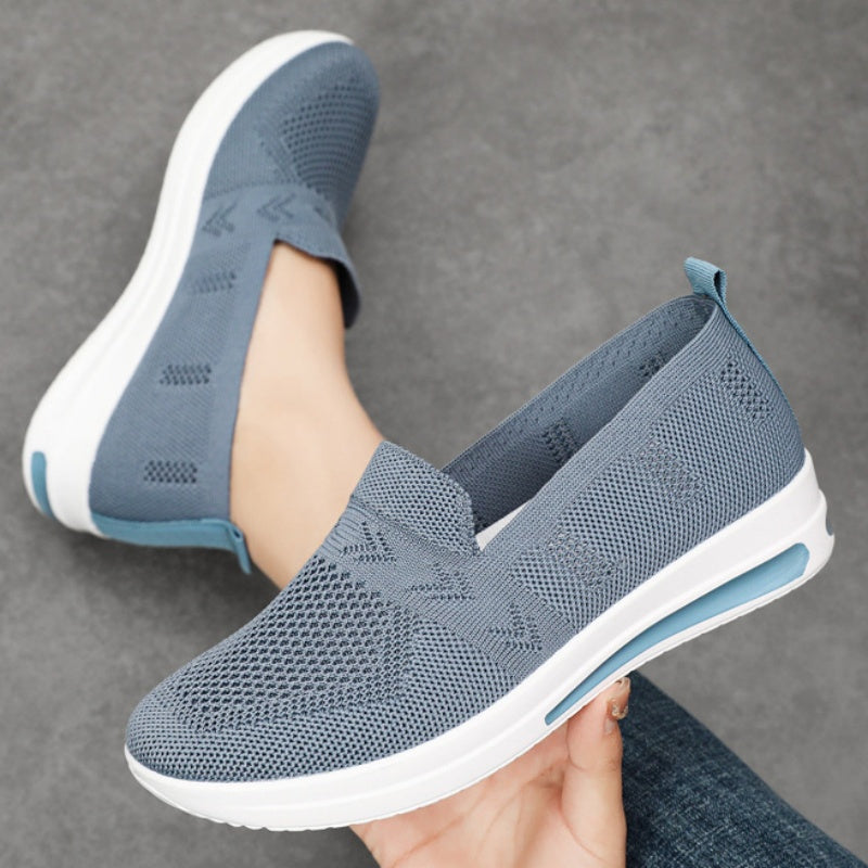 Women's lightweight, breathable flat shoes with air cushion support and slip-on design in solid colors. Stylish and comfortable for spring and autumn.