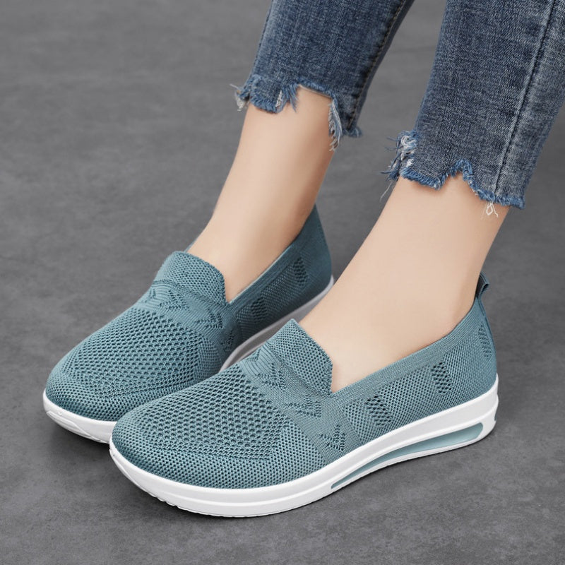 Women's lightweight, breathable flat shoes with air cushion support and slip-on design in solid colors. Stylish and comfortable for spring and autumn.