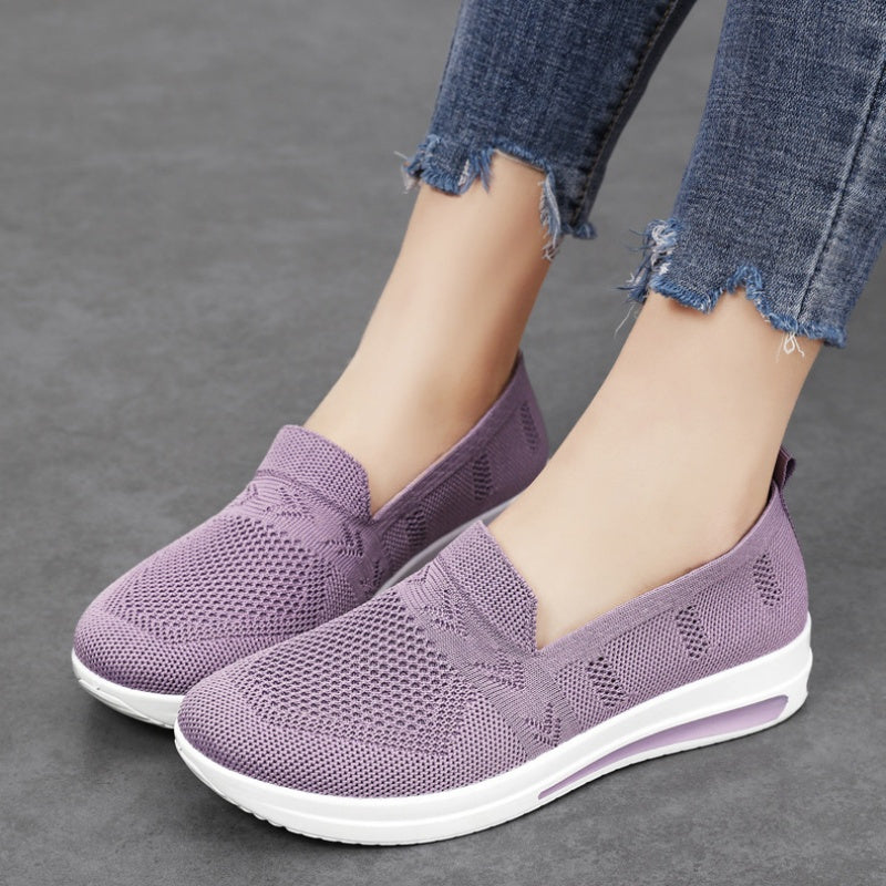 Women's lightweight, breathable flat shoes with air cushion support and slip-on design in solid colors. Stylish and comfortable for spring and autumn.