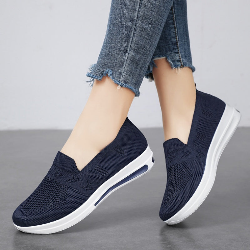 Women's lightweight, breathable flat shoes with air cushion support and slip-on design in solid colors. Stylish and comfortable for spring and autumn.