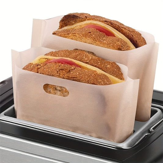 2 pieces of reusable fiberglass toaster bags with non-stick coating, measuring 16.0x16.51cm, perfect for making grilled cheese sandwiches, pizza paninis, and garlic bread. These bags are compatible with toasters, microwaves, and grills.