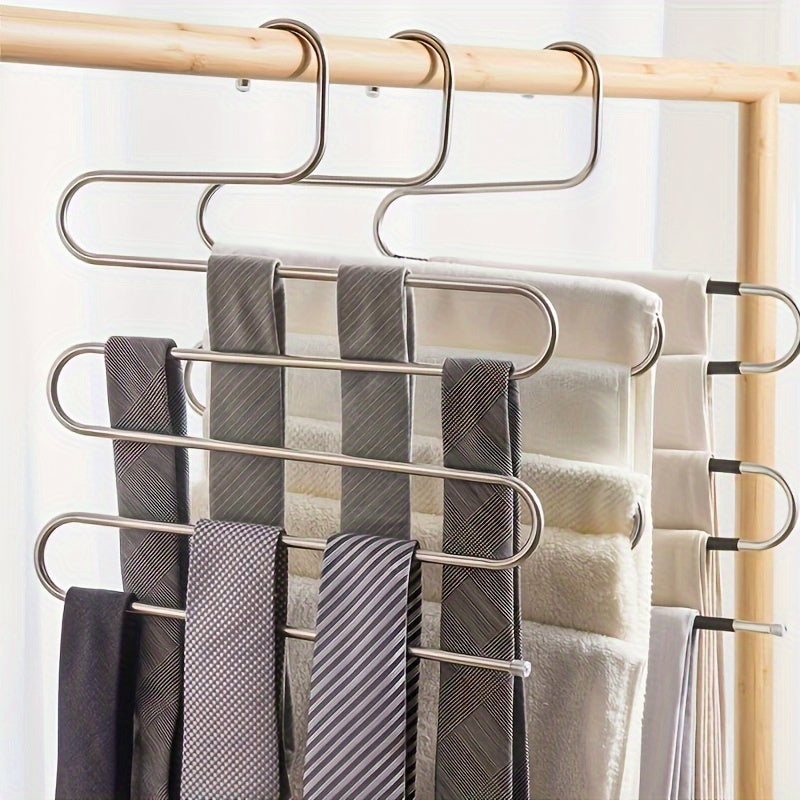 Space-saving stainless steel pants hanger with multiple layers for organizing trousers, towels, and scarves - features non-slip design.