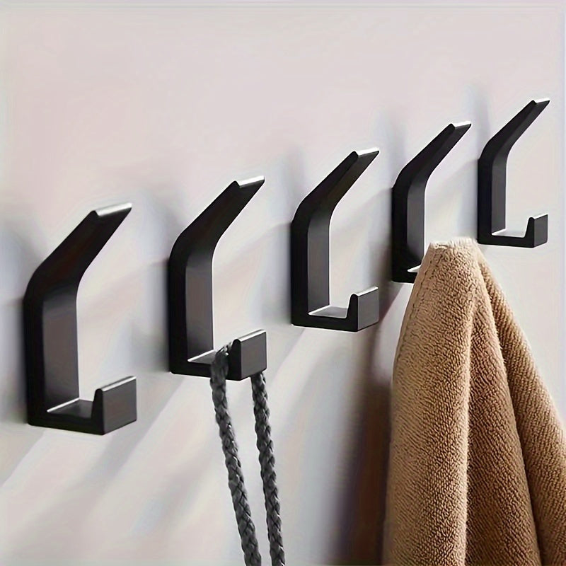 5 sleek black wall-mounted dual-hook set requires no drilling, easy to install with adhesive. Perfect for organization in bathroom, bedroom, and home. Can hold towels, coats, robes, keys, and more.