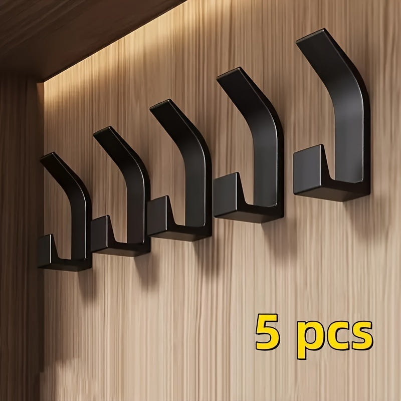 5 sleek black wall-mounted dual-hook set requires no drilling, easy to install with adhesive. Perfect for organization in bathroom, bedroom, and home. Can hold towels, coats, robes, keys, and more.