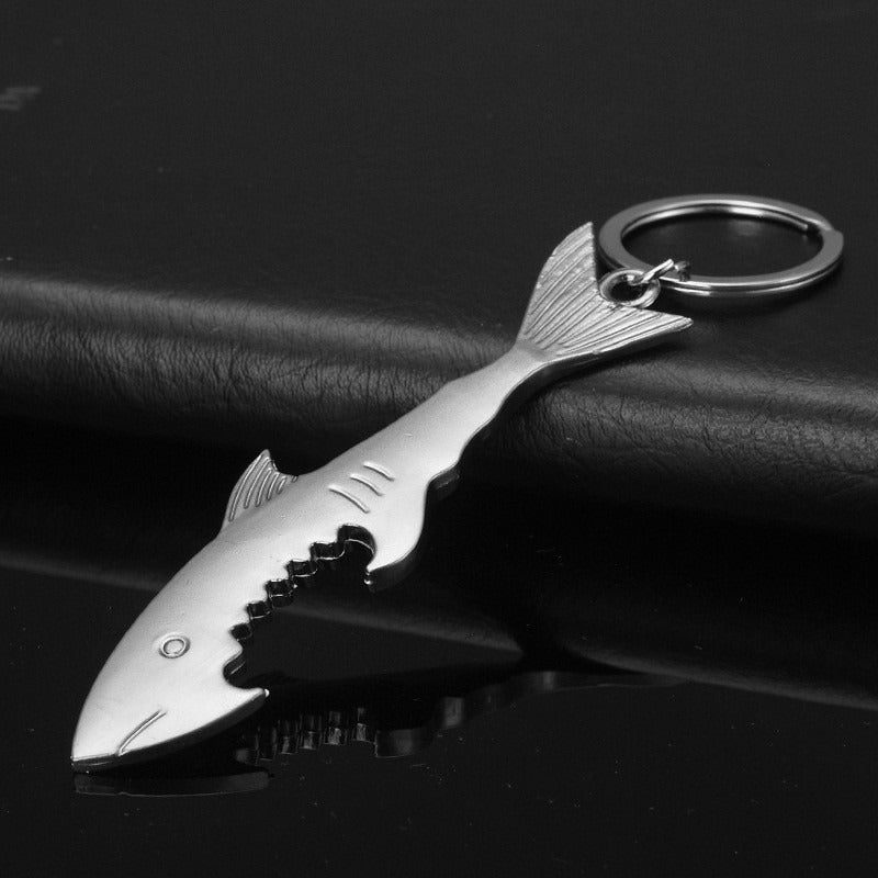 Shark-shaped stainless steel bottle opener keychain: a unique and creative beer accessory, perfect gift idea. Silvery color, made of alloy.