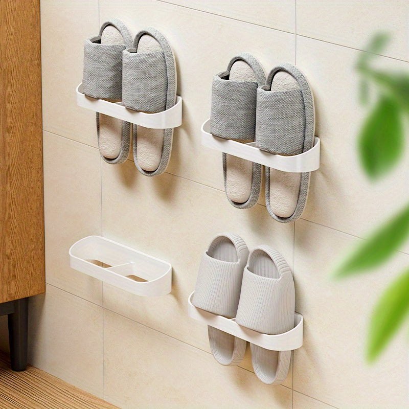 Wall-mounted bathroom slipper rack with perforation-free installation for convenient storage of shoes in the household bathroom. Ideal for organizing and storing bathroom slippers and other items.