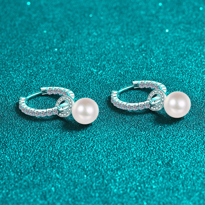 Elegant Shavano Drop Earrings featuring a 1.1 Carat Moissanite & Freshwater Pearl, crafted in 925 Sterling Silver. These earrings are perfect for weddings and gift-giving. They are inlaid with a secure clasp and weigh 4.7g.