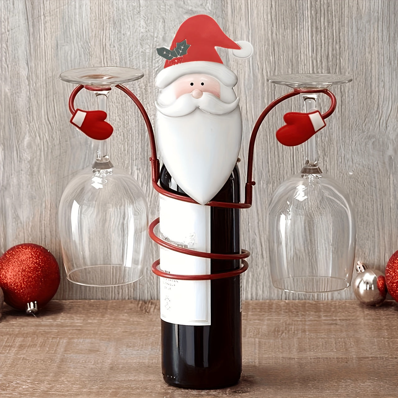 Festive Christmas wine bottle and glass holder set featuring Santa and Snowman designs; ideal for holiday dining decor and gifting.