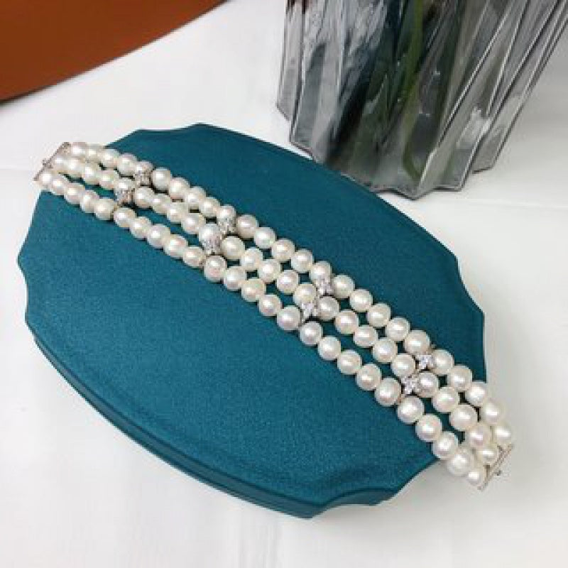 Stylish and sophisticated, this stunning multi-layer freshwater pearl bracelet is versatile for both casual outings and special occasions. It makes a perfect Mother's Day gift and is a must-have accessory in every woman's fashion collection.