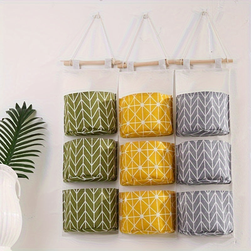 1pc Durable Linen Waterproof Hanging Storage Bag with 3-Tier Wall Mount and Wood Hanger for Home Organization.