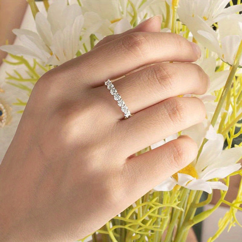 925 Sterling Silver Moissanite Ring with 18K Gold Plating - Featuring 0.7 Carat Total Weight and a Band of 7 Stones, Ideal for Women to Wear at Parties, Vacations, Music Festivals, and Celebrations. This Versatile Jewelry Piece is Perfect for All Seasons