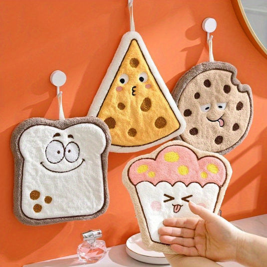 Cartoon food shaped hand towel made of soft coral fleece, quick-dry and absorbent for bathroom or kitchen use. Features designs of cheese, bread, and cookies, can be used as hanging wipe cloth. No electricity required.