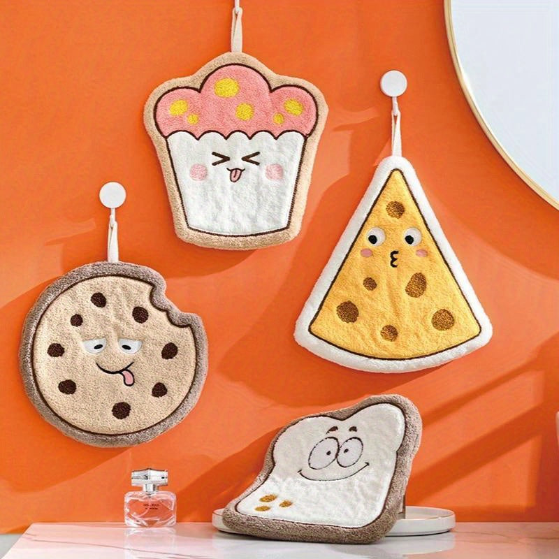 Cartoon food shaped hand towel made of soft coral fleece, quick-dry and absorbent for bathroom or kitchen use. Features designs of cheese, bread, and cookies, can be used as hanging wipe cloth. No electricity required.