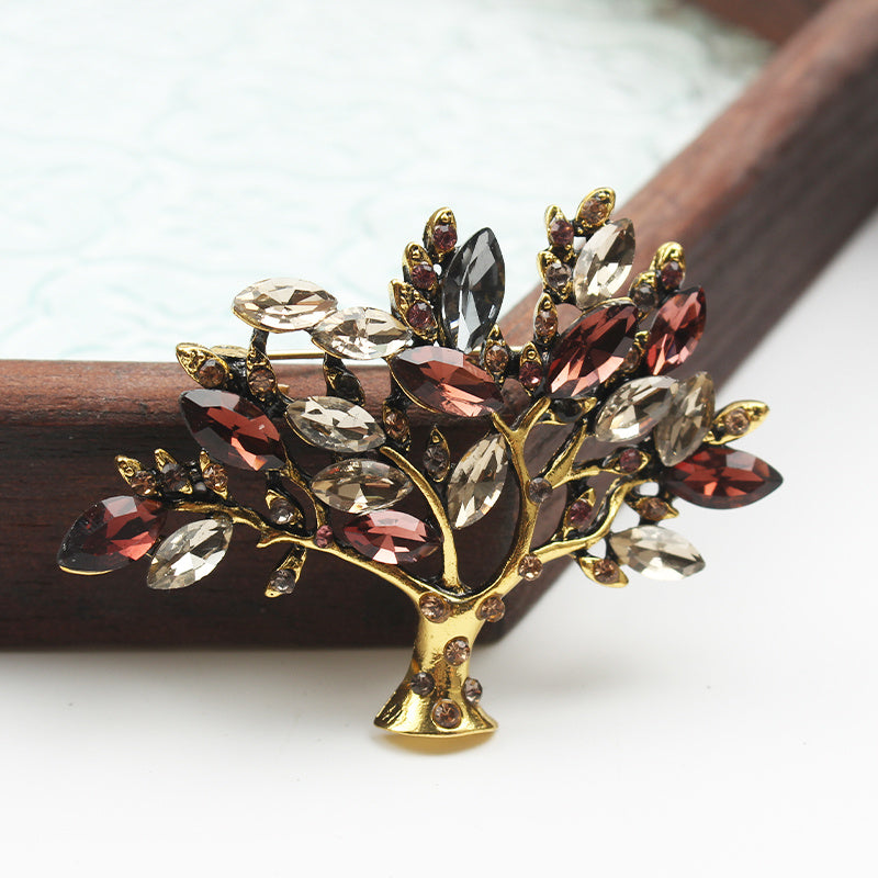 Luxurious Vintage-Inspired Brooch adorned with Rhinestones, featuring a Unique and Unconventional Wishing Tree Design.