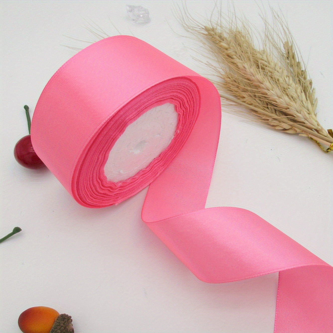 This satin ribbon roll is 40mm wide and comes in a 25yd length, perfect for gift wrapping, headbands, wreaths, wedding decor, and sewing projects. Made with a smooth texture and no mosaic material, this fabric accessory is versatile and can be used for a