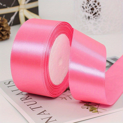 This satin ribbon roll is 40mm wide and comes in a 25yd length, perfect for gift wrapping, headbands, wreaths, wedding decor, and sewing projects. Made with a smooth texture and no mosaic material, this fabric accessory is versatile and can be used for a