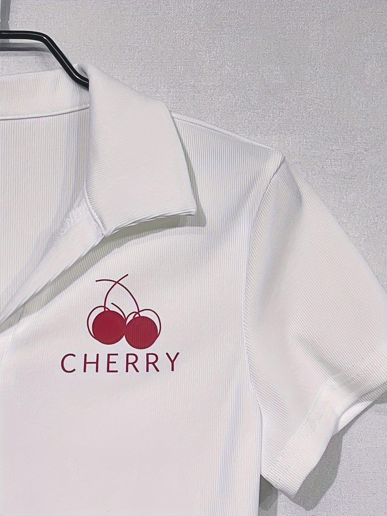 Y2K-inspired white cherry print top, perfect for spring/summer wear. Made of casual polyester knit, machine washable.