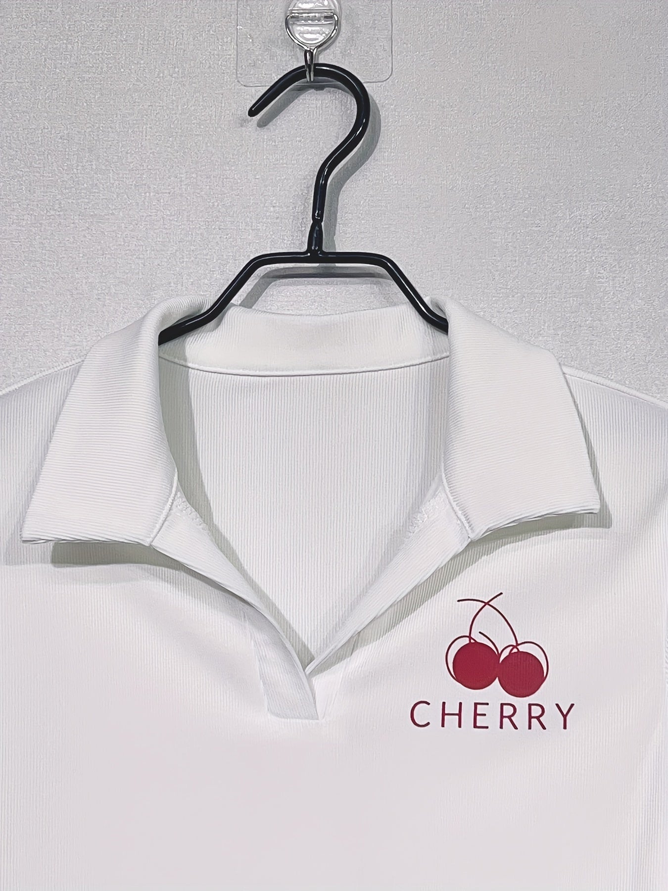 Y2K-inspired white cherry print top, perfect for spring/summer wear. Made of casual polyester knit, machine washable.