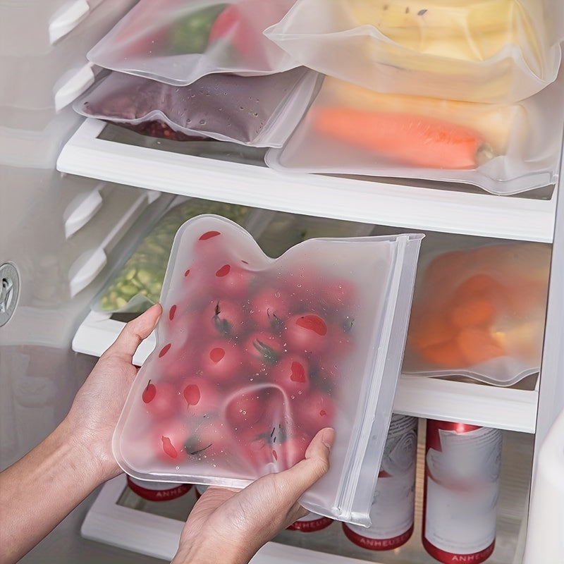 Set of 4 durable silicone food storage bags that can be reused, free of BPA and leakproof with ziplock closures. Ideal for preserving vegetables, fruits, meats, and snacks. Helps in eco-friendly kitchen organization, safe for food contact, perfect for