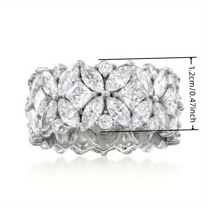 An elegant wide-faced ring designed for women, featuring a delicate micro-set zirconia flower design. Ideal for everyday casual gatherings, coordinating with outfits, and as a thoughtful anniversary present.