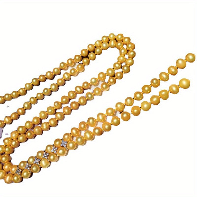 New for the autumn and winter season, this elegant and classic long chain sweater featuring natural freshwater golden pearls is perfect for formal occasions, banquets, or everyday wear. With minor flaws that add to its unique charm, this stunning piece