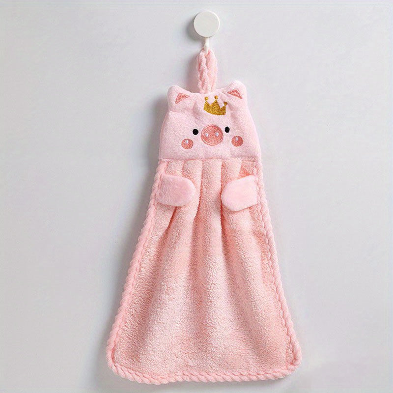 Adorable pig-themed microfiber hand towel in pink, light pink, or gray. Ultra absorbent and soft with hanging loop. Ideal for home use. Quick-drying for kitchen or bathroom.