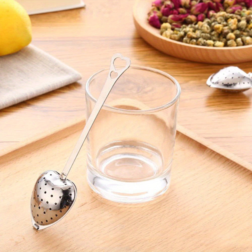 Heart-shaped tea infuser set made from stainless steel, available in a 1pc or 2pcs option. Features a fine mesh for loose leaf tea, sturdy handle for easy use, and is perfect for brewing tea, herbs, and spices. Durable, easy to clean, and makes for an