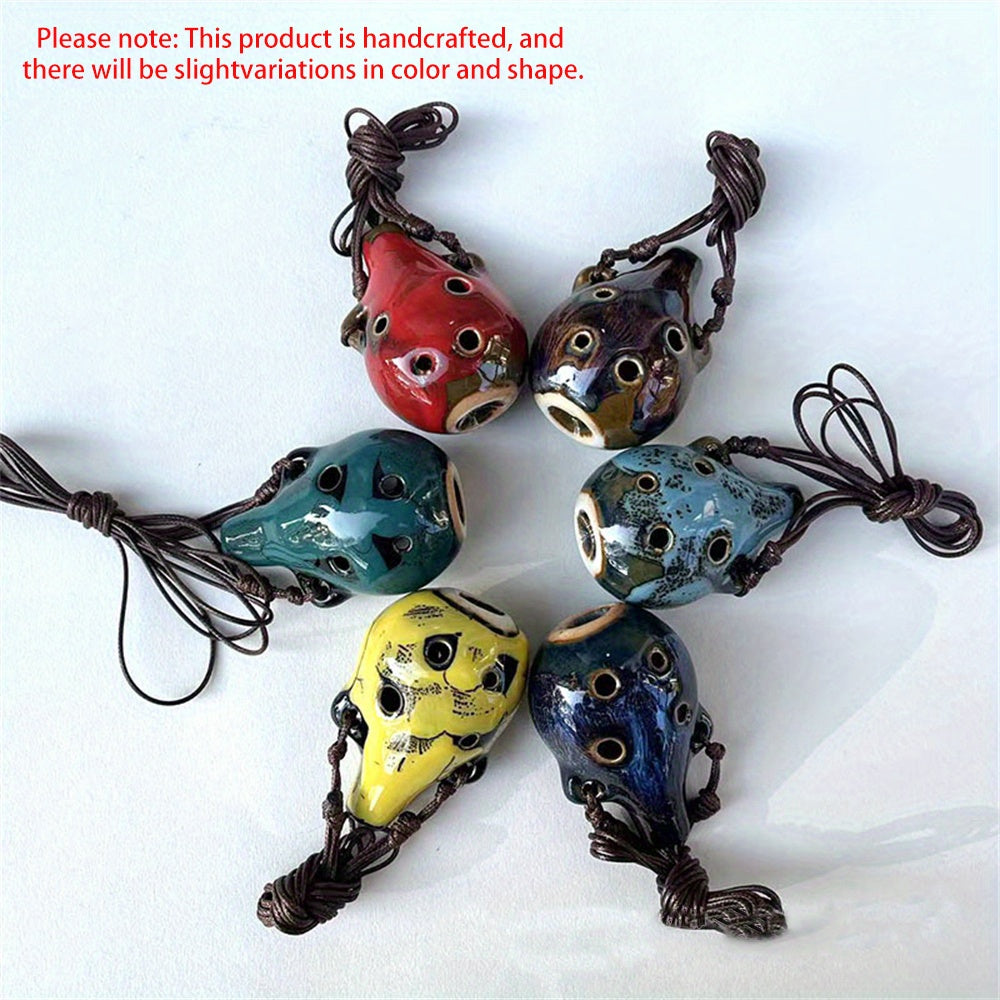 Portable ceramic ocarina flute with 6 holes, adjustable necklace, clear tone, and vibrant colors, perfect for beginners.