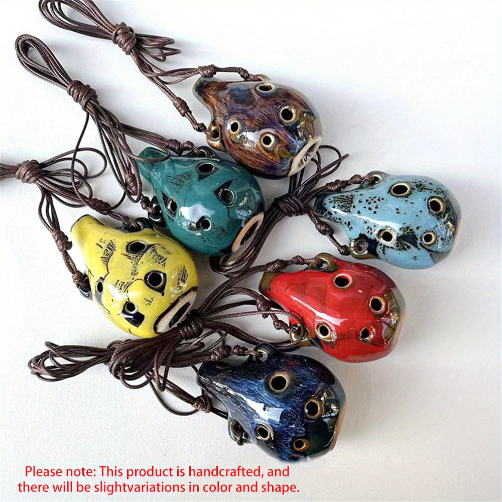 Portable ceramic ocarina flute with 6 holes, adjustable necklace, clear tone, and vibrant colors, perfect for beginners.