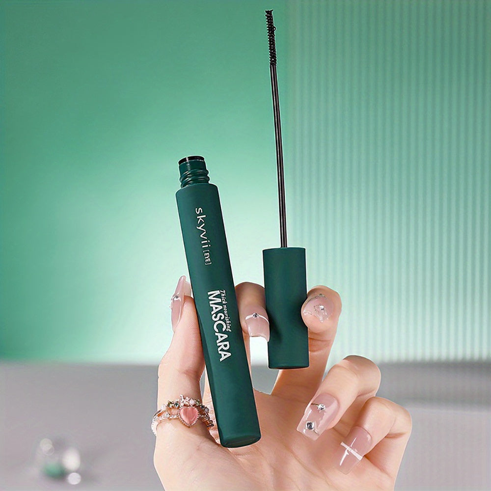 Waterproof black 4D mascara for extra long, volumized lashes that are long-lasting, natural, smudge-proof, and easy to apply with plant squalane for added charm.